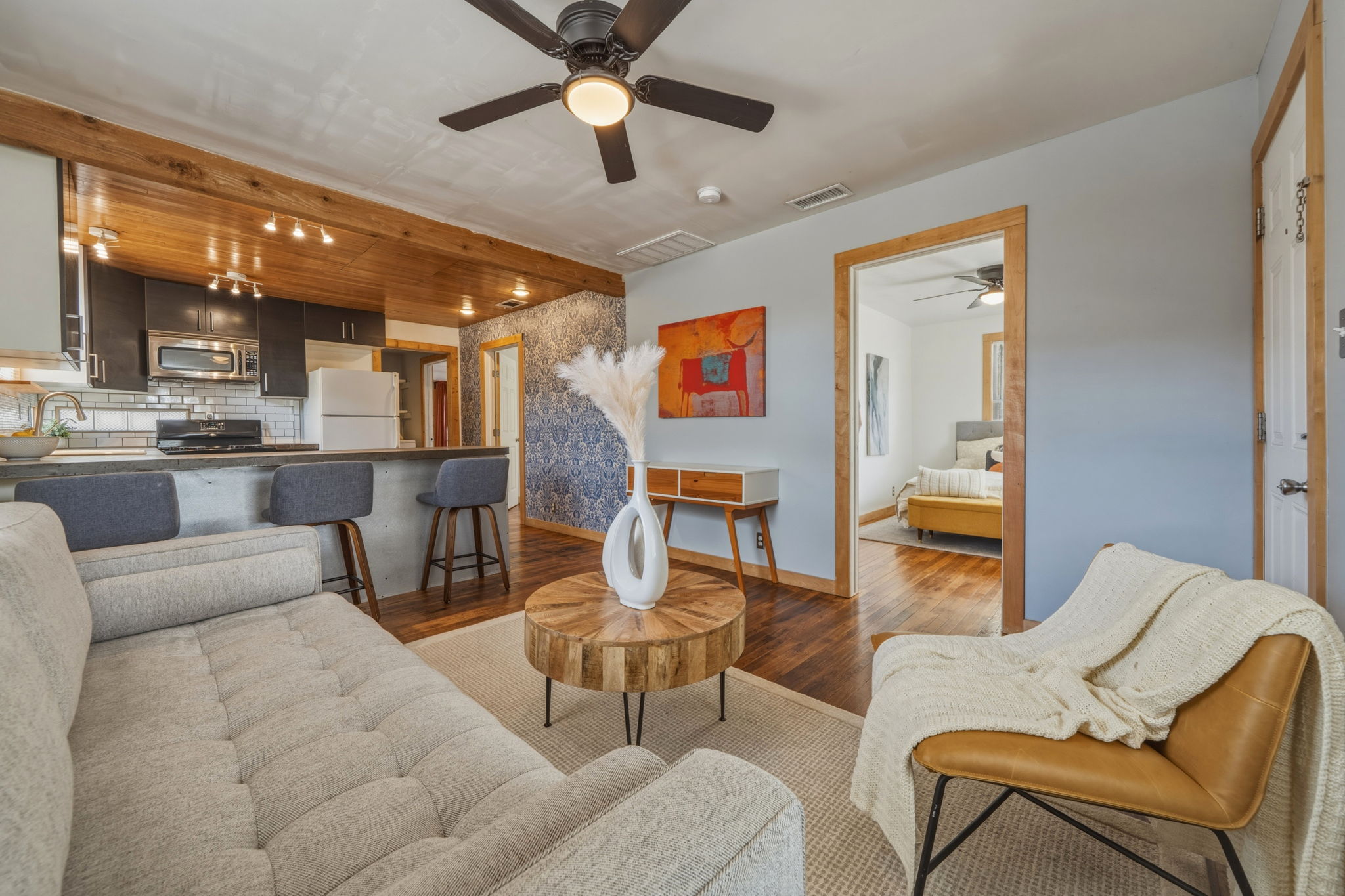 4806 Santa Anna Street Austin, TX 78721 - Photo 5 of 35 Living room featuring wood flooring and ceiling fan