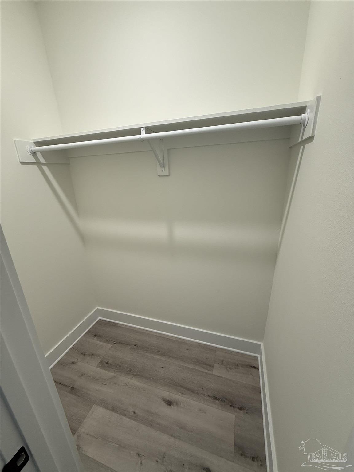 8636 Messick Street, Unit A Pensacola, FL 32534 - Photo 12 of 13 a view of an empty walk in closet