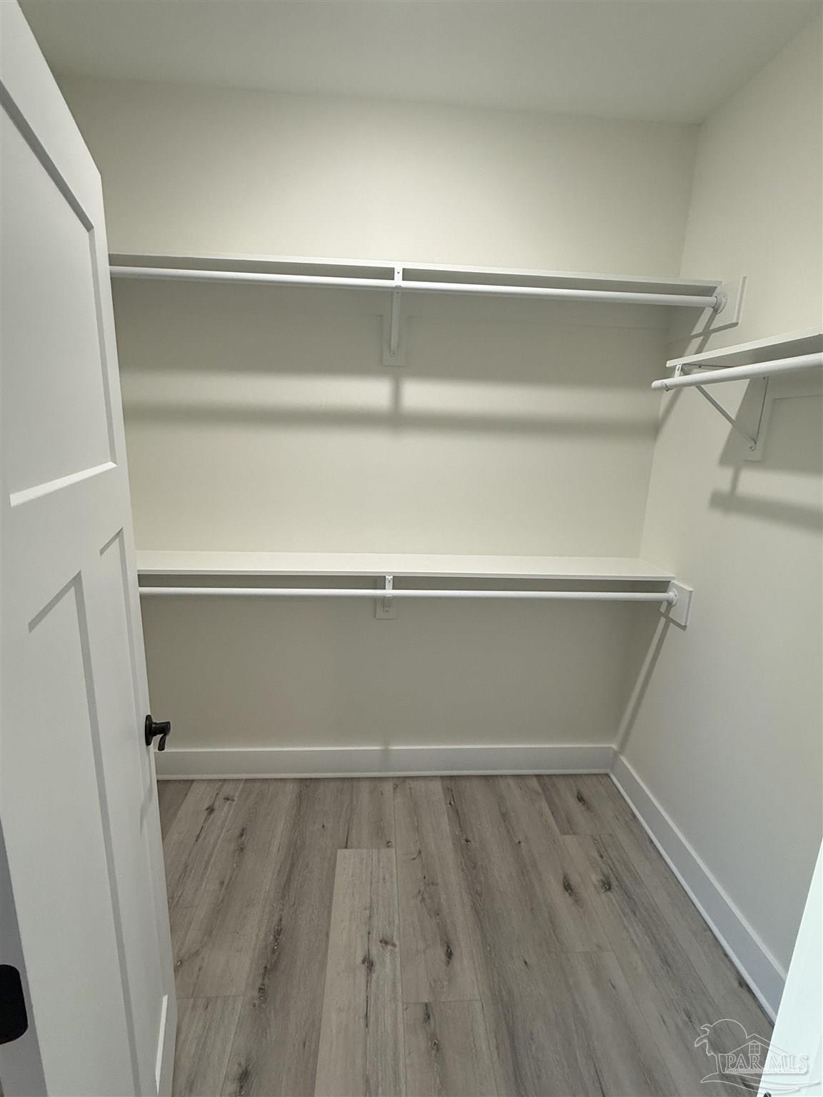 8636 Messick Street, Unit A Pensacola, FL 32534 - Photo 8 of 13 a view of an empty walk in closet