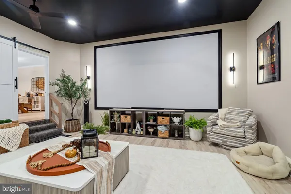 a living room with furniture and a table