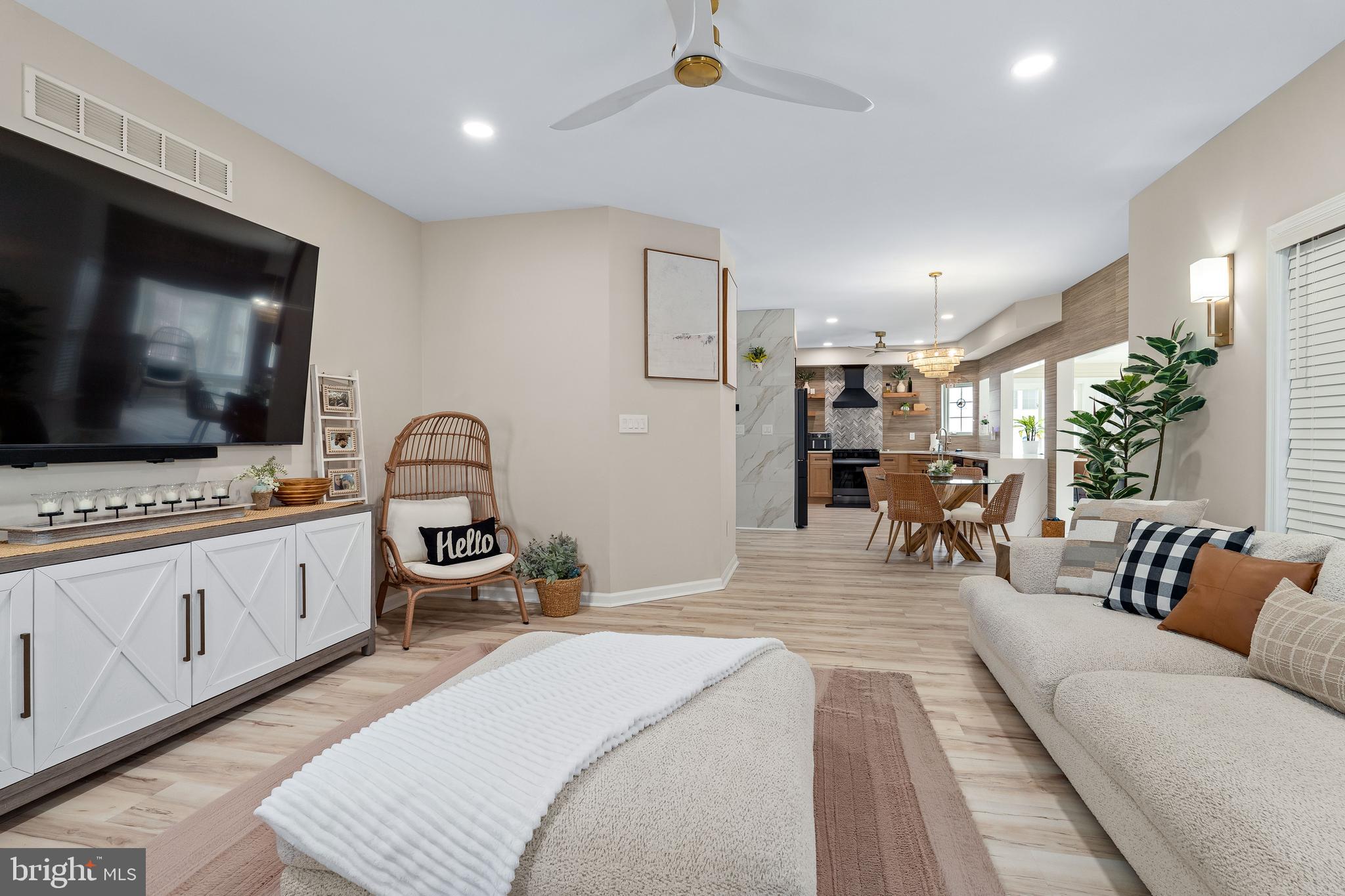 303 Beacon Point Drive Perryville, MD 21903 - Photo 18 of 43 a large bedroom with a bed and a flat screen tv