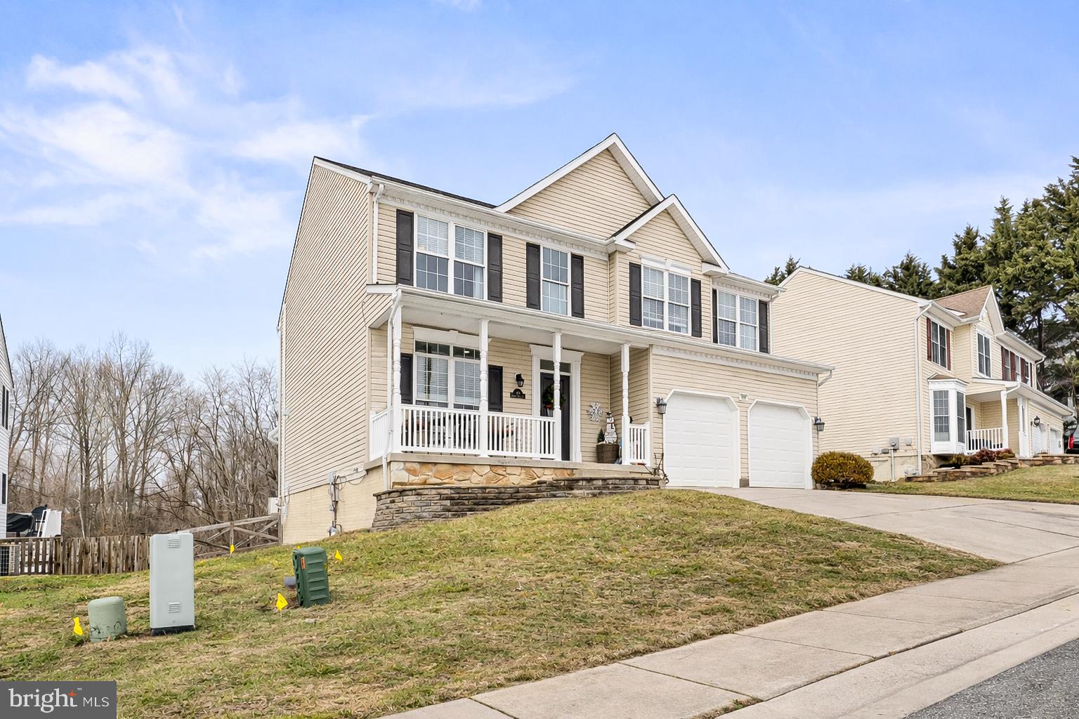 303 Beacon Point Drive Perryville, MD 21903 - Photo 2 of 43 a front view of a house with a yard