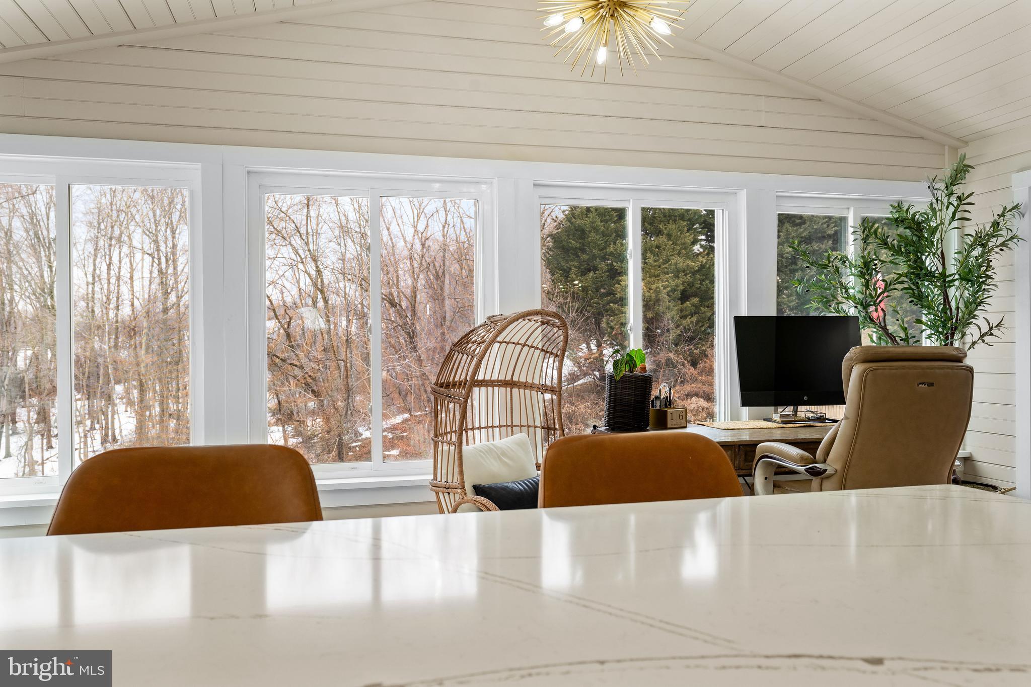 303 Beacon Point Drive Perryville, MD 21903 - Photo 24 of 43 a living room with furniture and a flat screen tv
