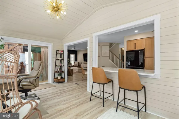 a view of a livingroom with furniture and furniture