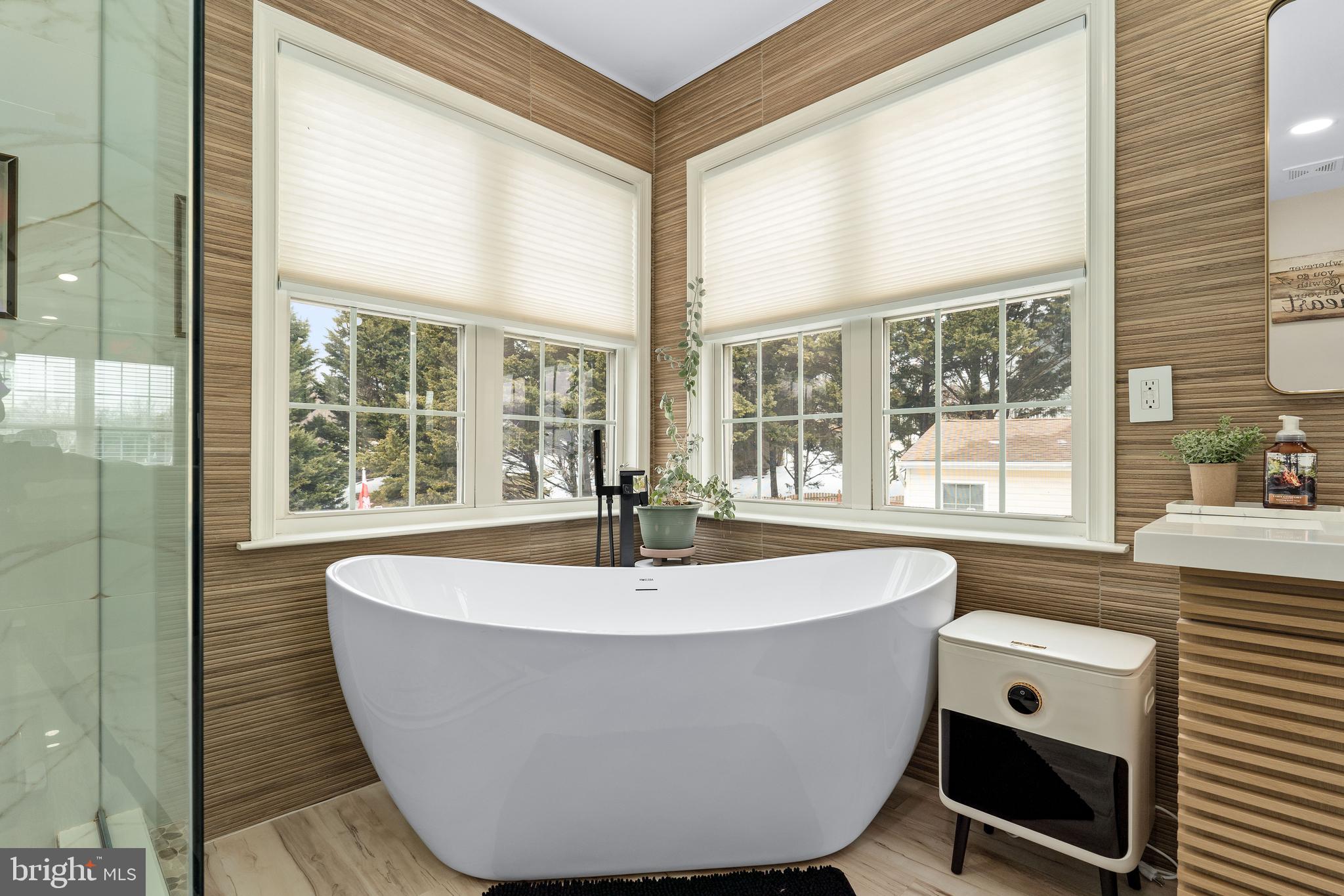 303 Beacon Point Drive Perryville, MD 21903 - Photo 40 of 43 a white bath tub sitting in front of a window