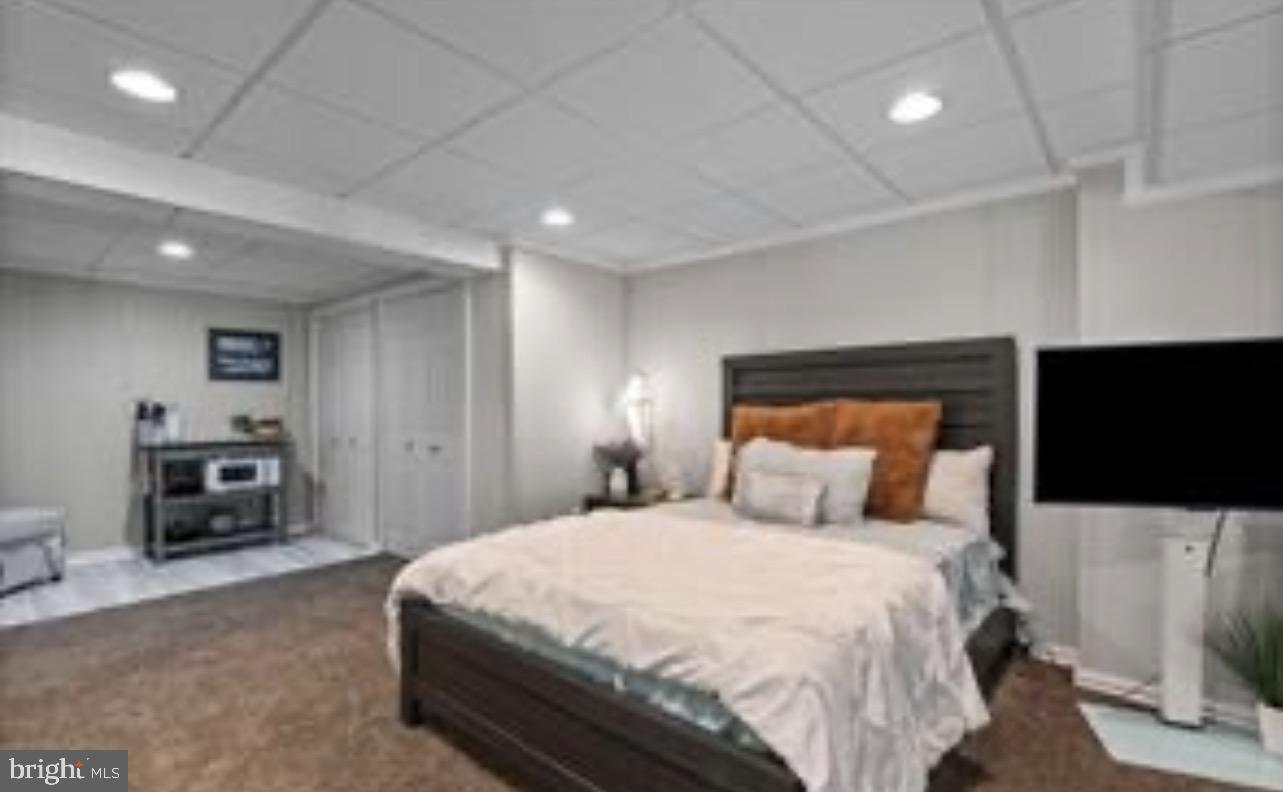 303 Beacon Point Drive Perryville, MD 21903 - Photo 42 of 43 a bedroom with a bed and a television