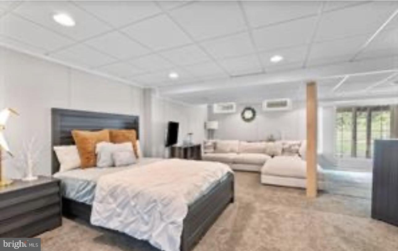 303 Beacon Point Drive Perryville, MD 21903 - Photo 43 of 43 a bedroom with double bed and a large window