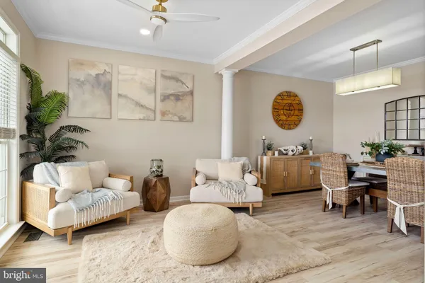 a living room with furniture and a table