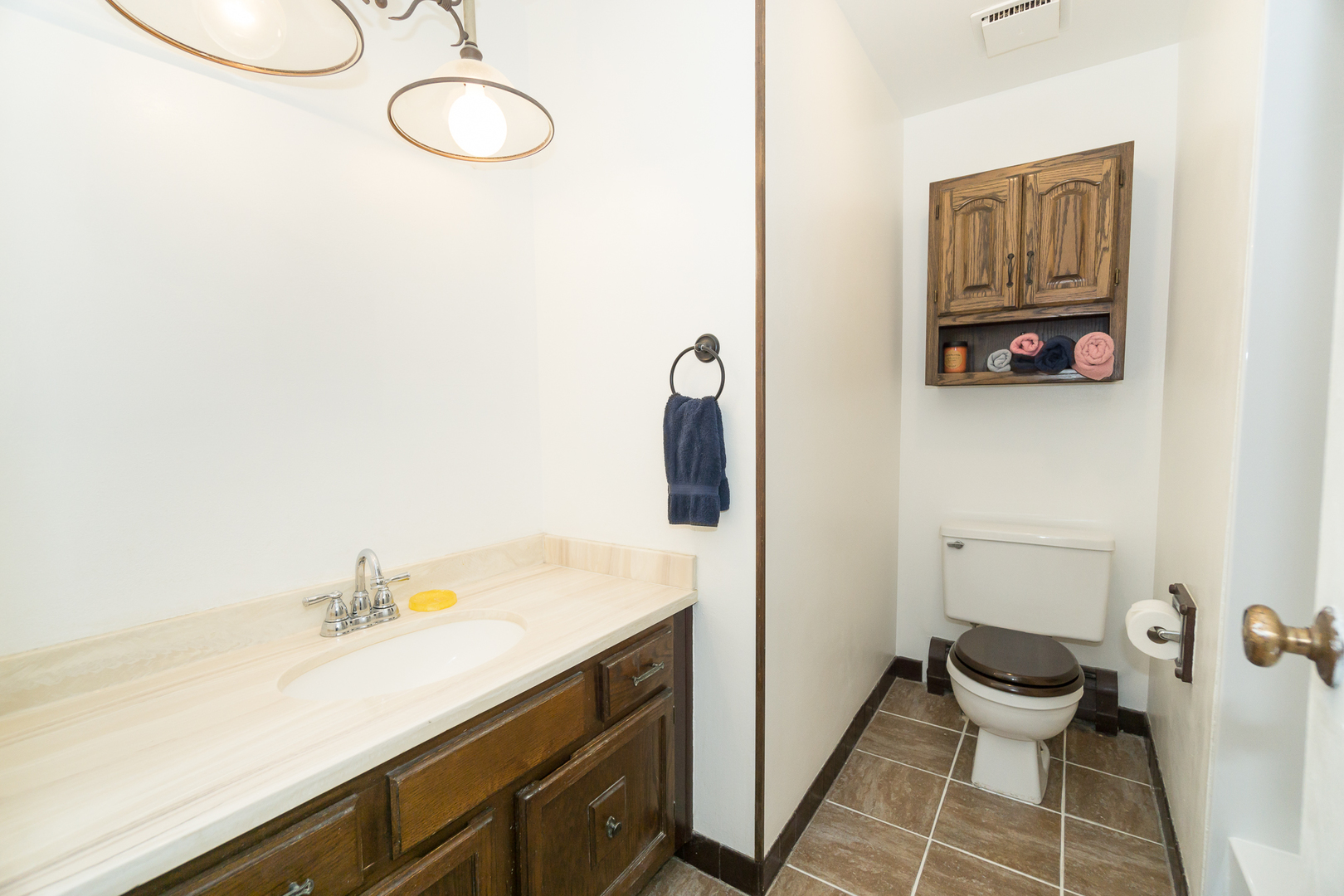 922 West Irving Park Road, Unit 303 Bensenville, IL 60106 - Photo 12 of 16 a bathroom with a sink and a mirror