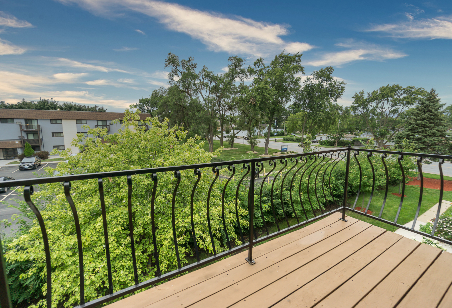 922 West Irving Park Road, Unit 303 Bensenville, IL 60106 - Photo 14 of 16 a view of balcony with wooden floor