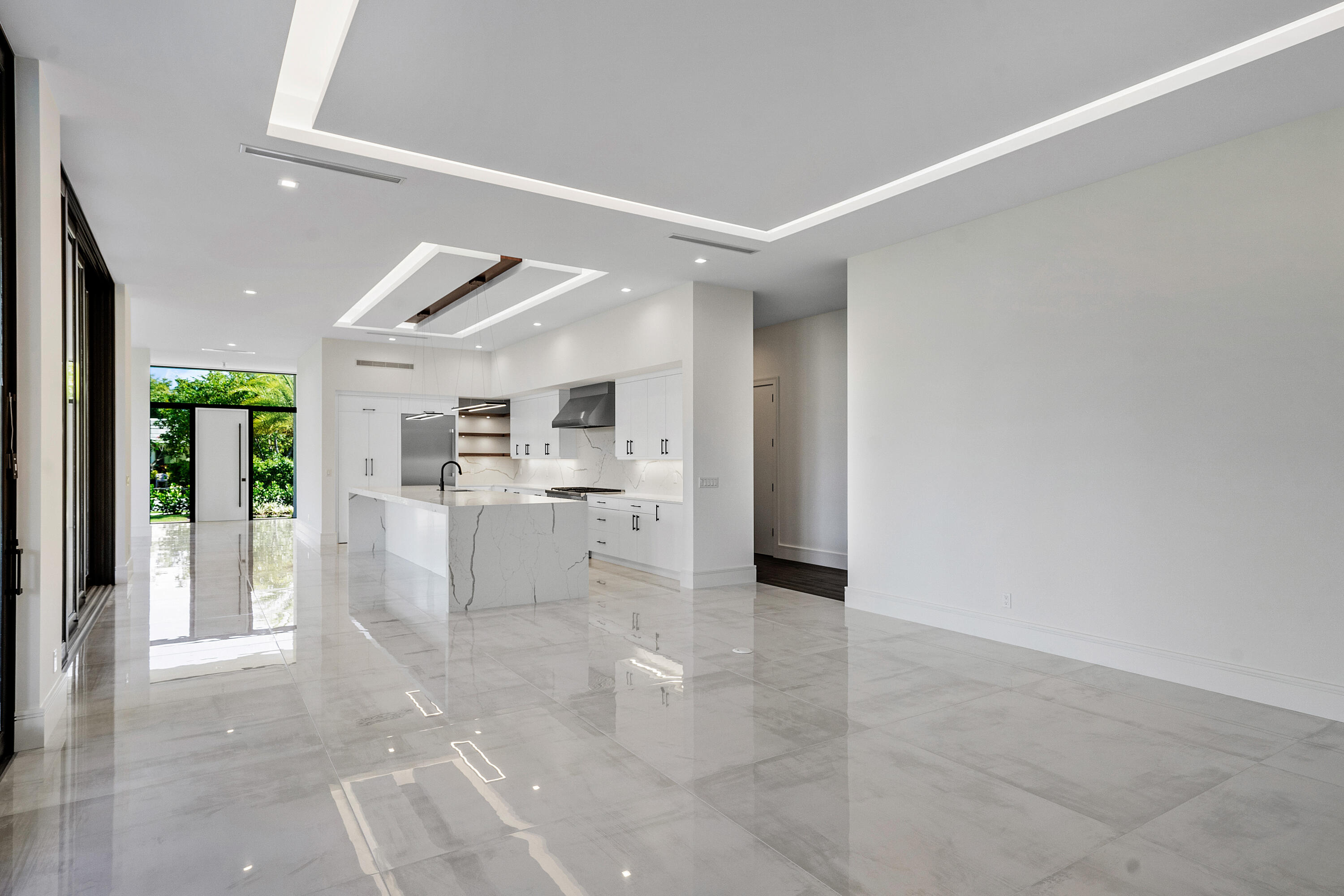 10 Coconut Road Delray Beach, FL 33444 - Photo 9 of 41 a view of kitchen with furniture and refrigerator