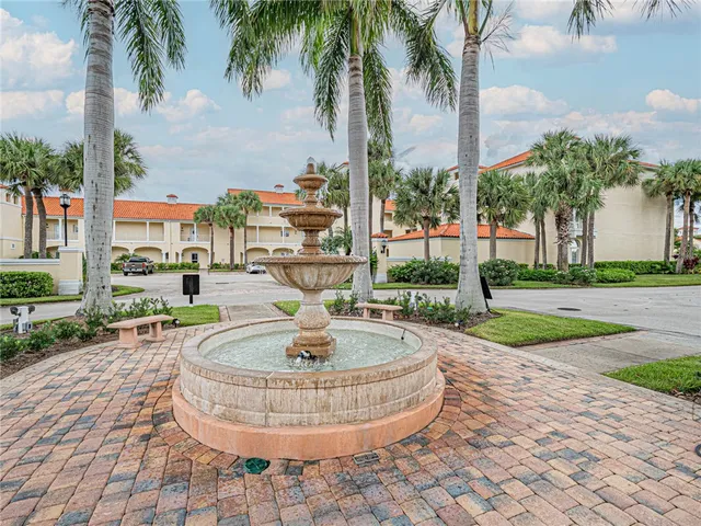 a view of a backyard with a fountain and a fountain