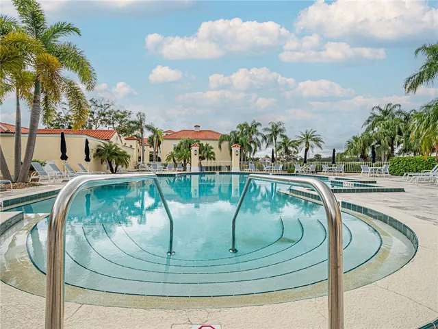 a view of swimming pool with a yard