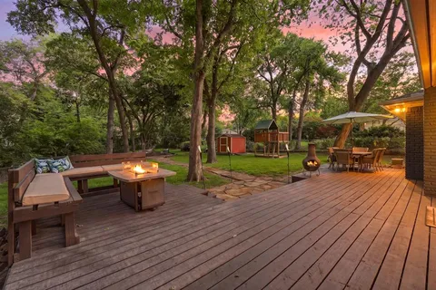 a view of a house with a yard porch and sitting area