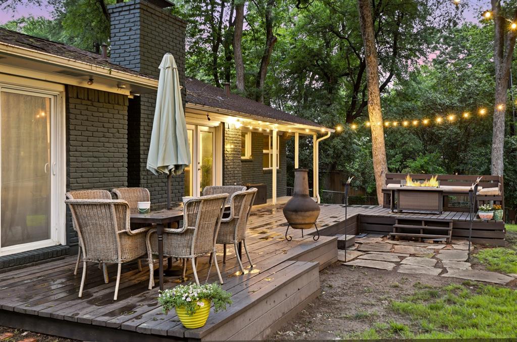 2320 Chart Drive Dallas, TX 75228 - Photo 25 of 34 a view of a patio with table and chairs and potted plants