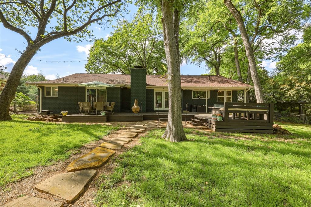 2320 Chart Drive Dallas, TX 75228 - Photo 30 of 34 a view of a house with a yard porch and sitting area