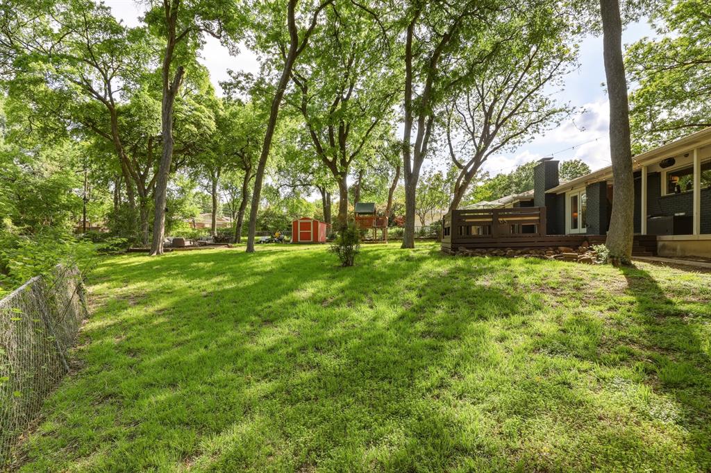 2320 Chart Drive Dallas, TX 75228 - Photo 31 of 34 a view of a yard with large trees