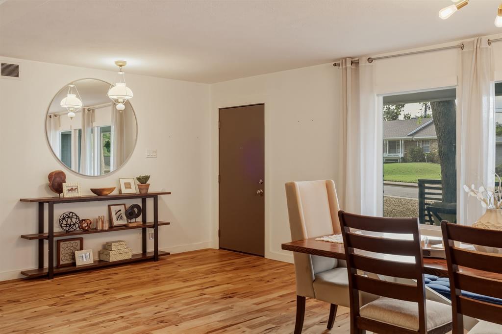 2320 Chart Drive Dallas, TX 75228 - Photo 6 of 34 a view of a dining room with furniture and a wooden floor