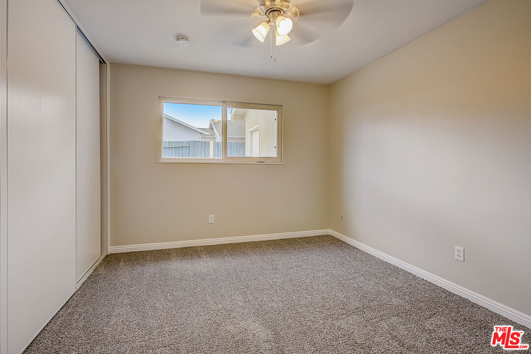 1817 Rolling Hills Drive Fullerton, CA 92835 - Photo 7 of 29 a view of an empty room with a window