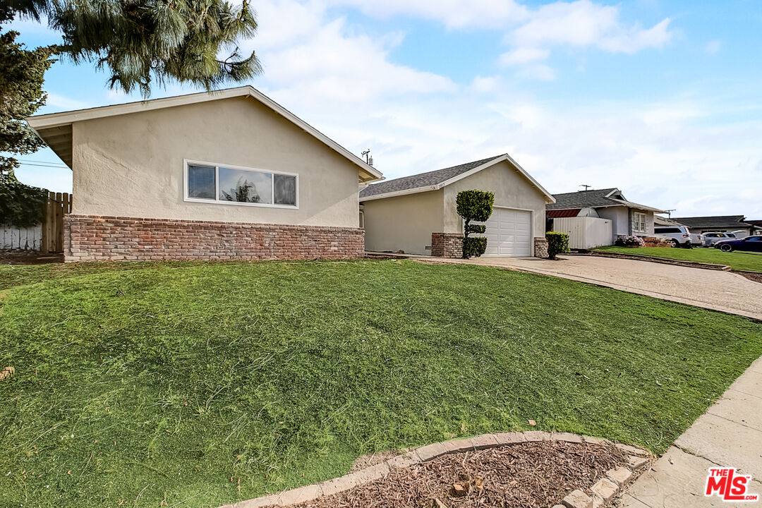 1817 Rolling Hills Drive Fullerton, CA 92835 - Photo 10 of 29 a view of a house with a yard