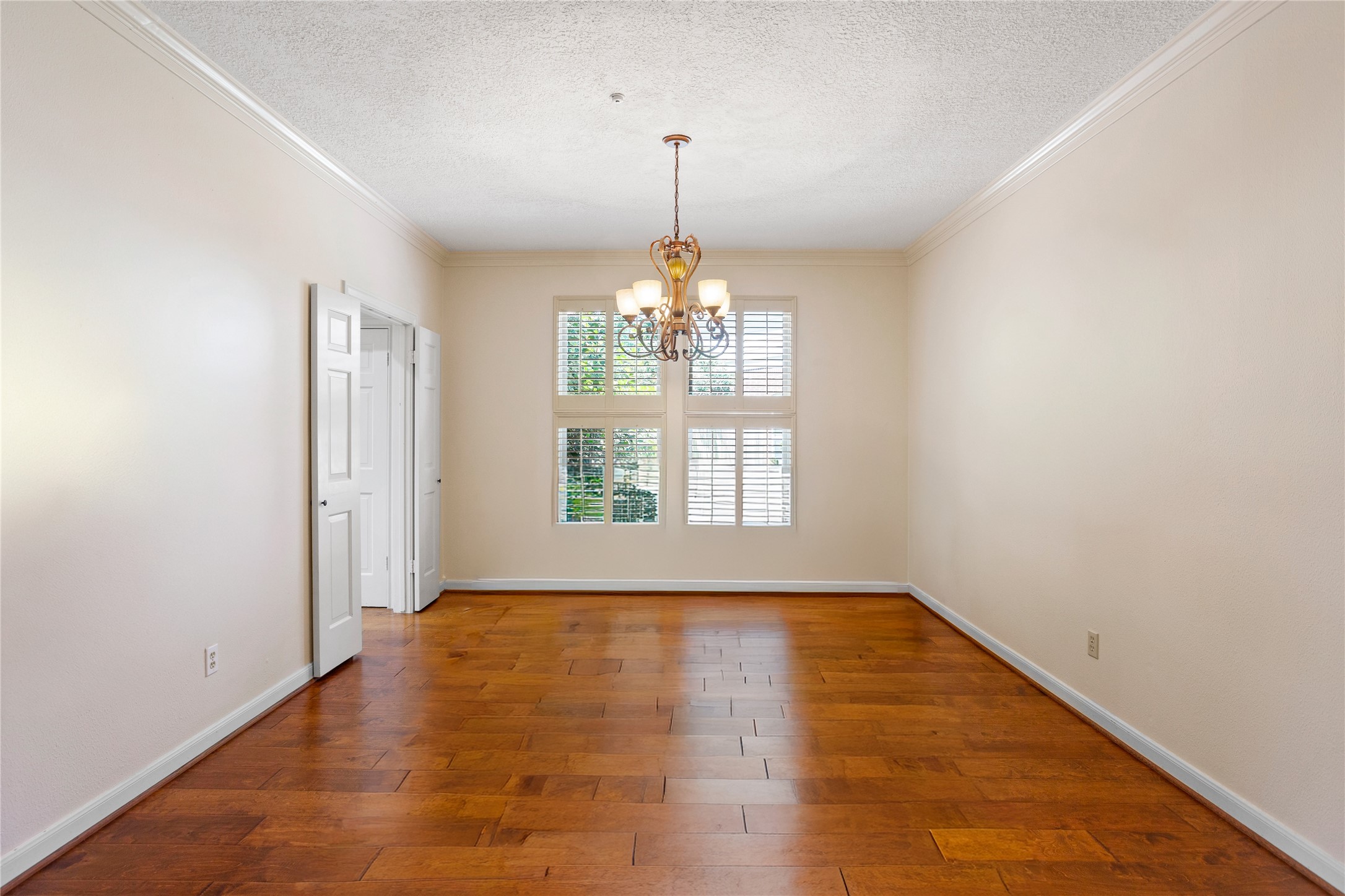 22015 Fielder Drive Katy, TX 77450 - Photo 15 of 38 a view of an empty room with chandelier and window