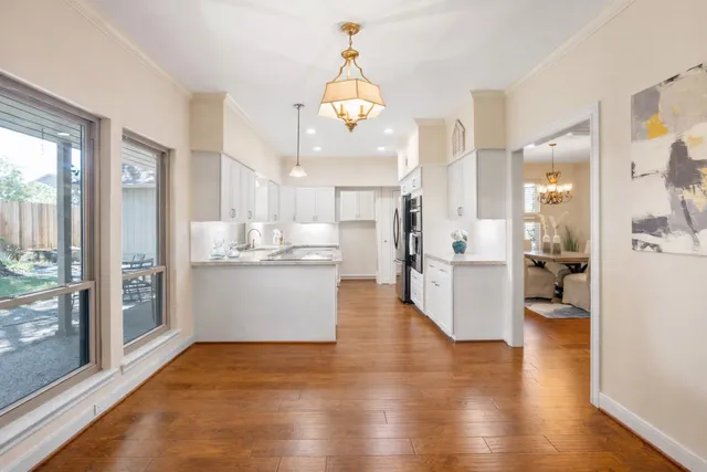 a view of a kitchen and dining room