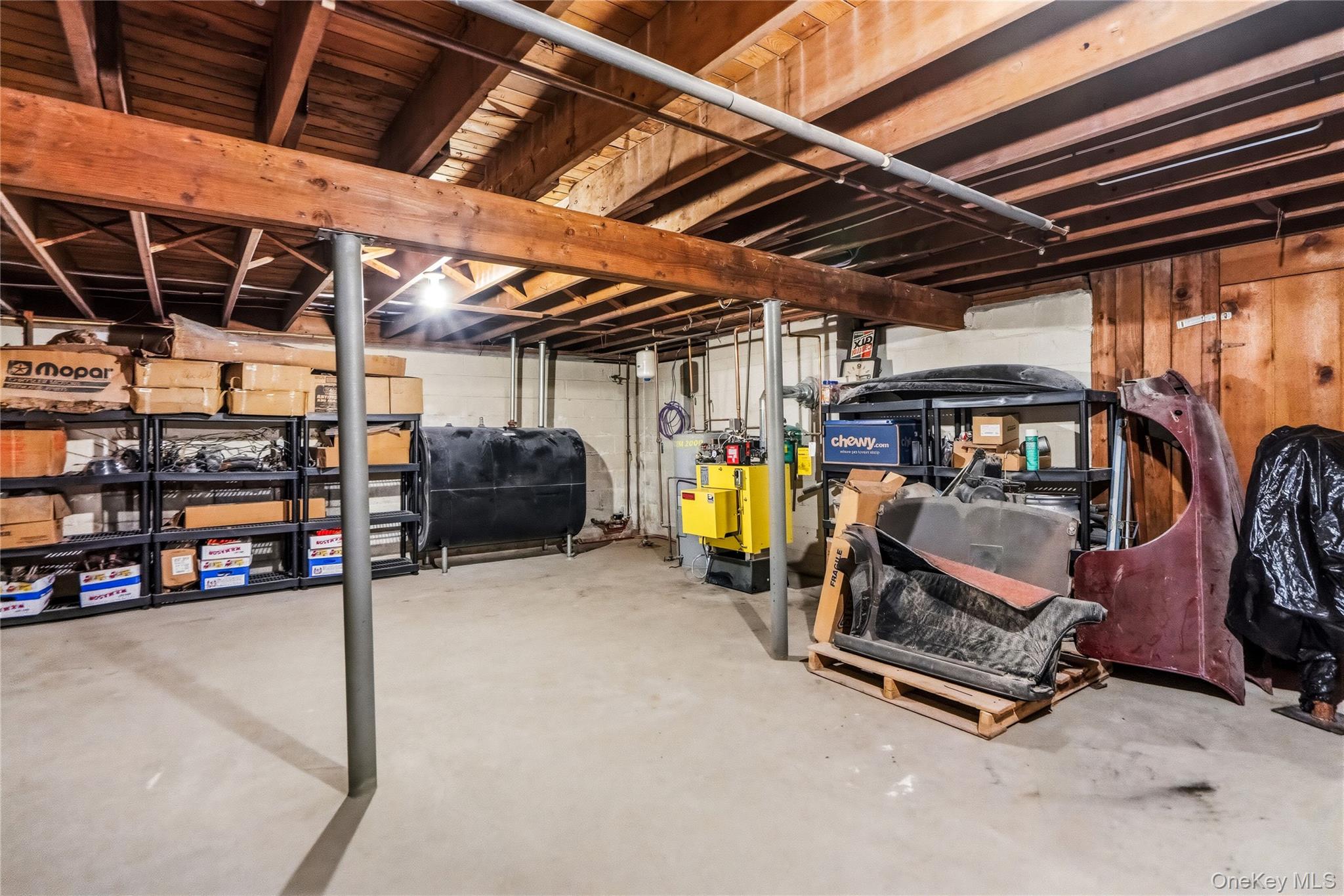 263 Beaver Dam Road Brookhaven, NY 11719 - Photo 23 of 32 a view of a room with gym equipment
