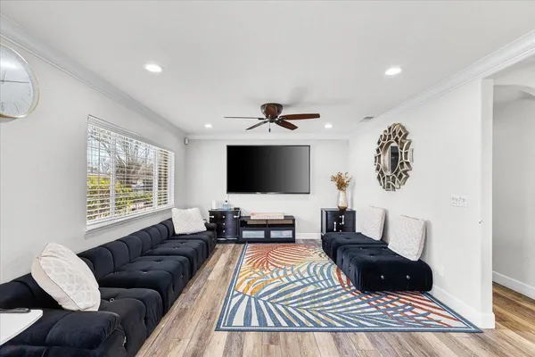 a living room with a couch and a flat screen tv