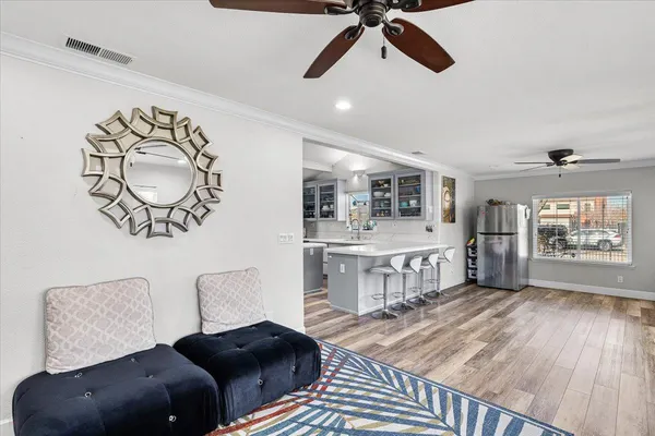 a living room with furniture and a window