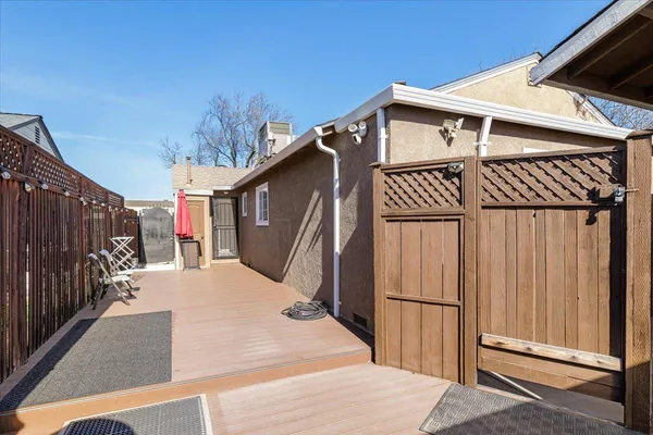 a view of a wooden house with a large window