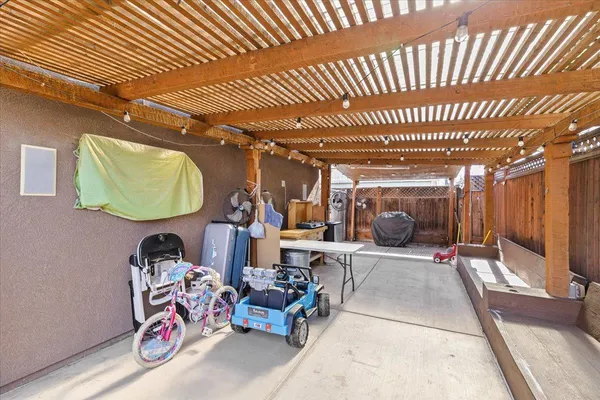 a view of a room with lots of furniture
