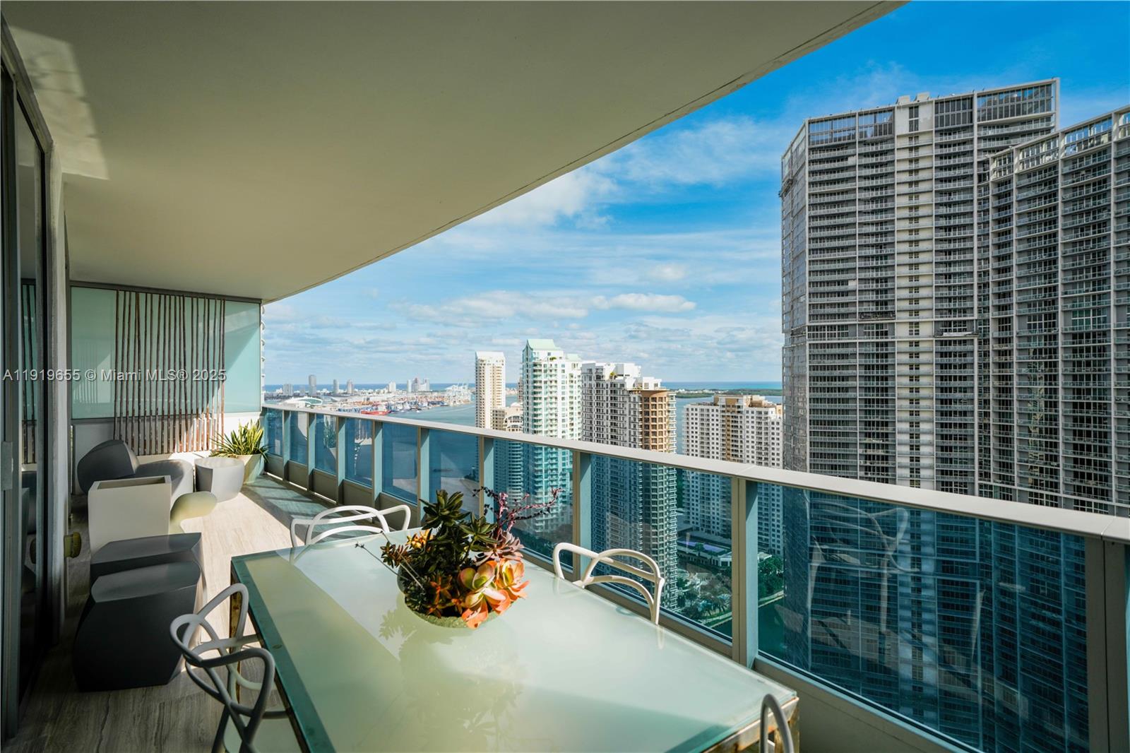 200 Biscayne Blvd Way, Unit 3906 Miami, FL 33131 - Photo 6 of 26 a view of balcony with a potted plant