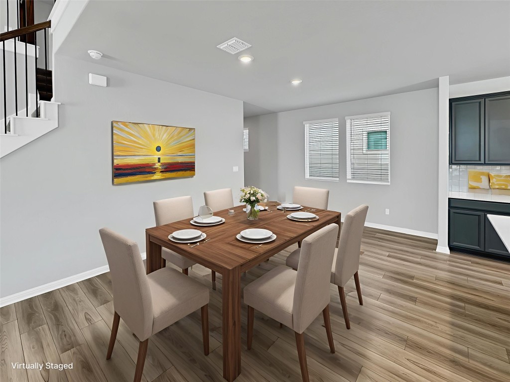 2437 Roosevelt Road Leander, TX 78641 - Photo 10 of 35 Dining room with light wood finished floors, recessed lighting.