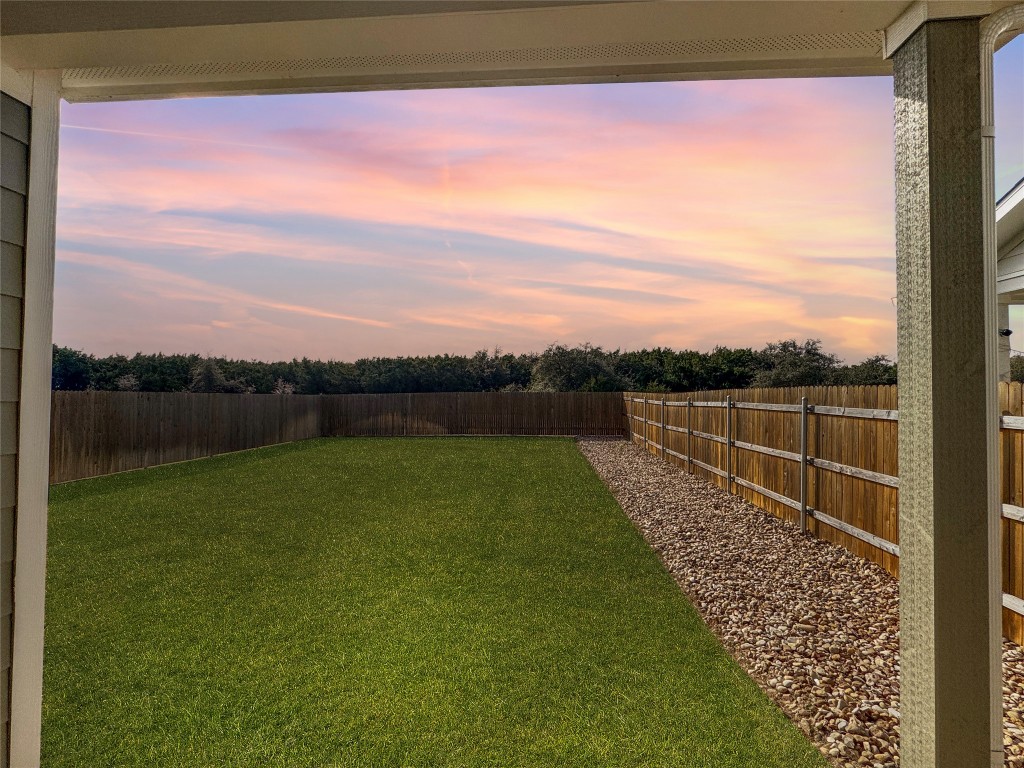 2437 Roosevelt Road Leander, TX 78641 - Photo 34 of 35 This yard is HUGE with no neighbors and only beautiful green views and that Incredible Texas sky!