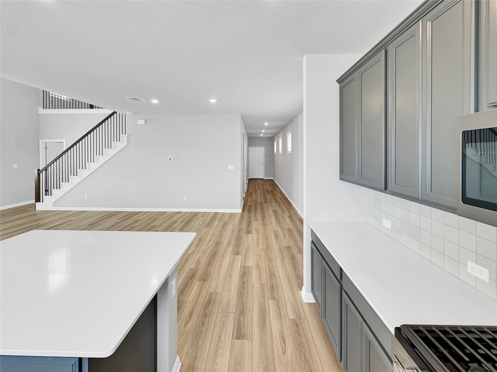 2437 Roosevelt Road Leander, TX 78641 - Photo 5 of 35 Inside the kitchen now looking towards the entry door.