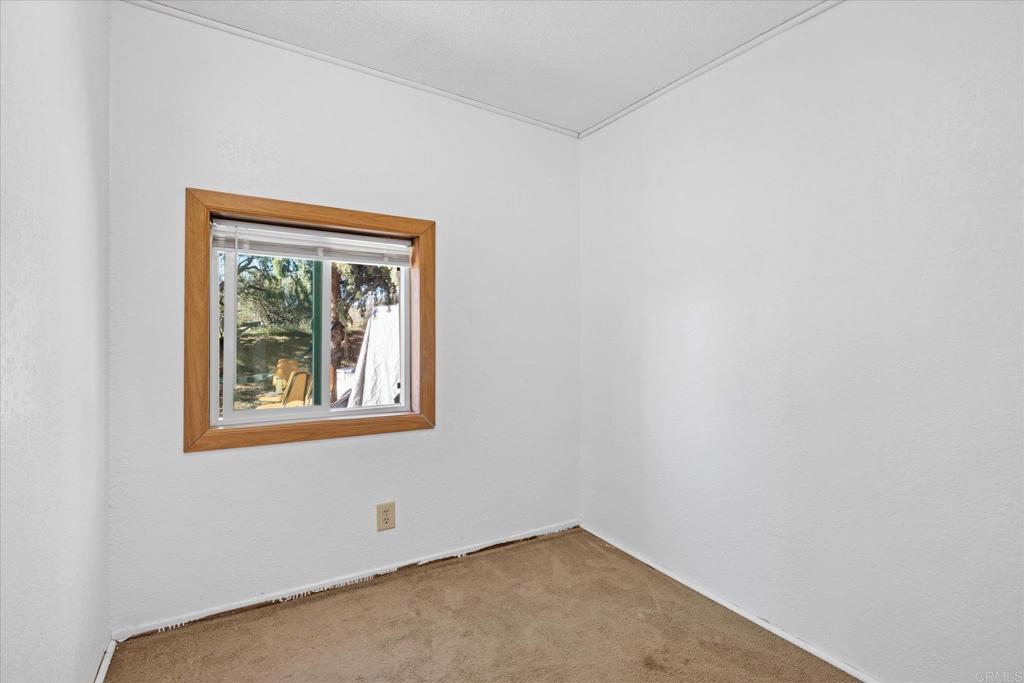 59063 Reynolds Way Anza, CA 92539 - Photo 19 of 34 a view of an empty room with a window