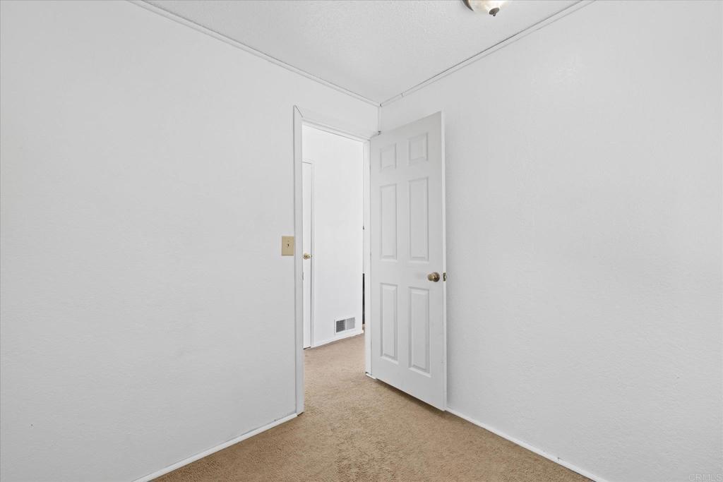 59063 Reynolds Way Anza, CA 92539 - Photo 20 of 34 a view of a hallway