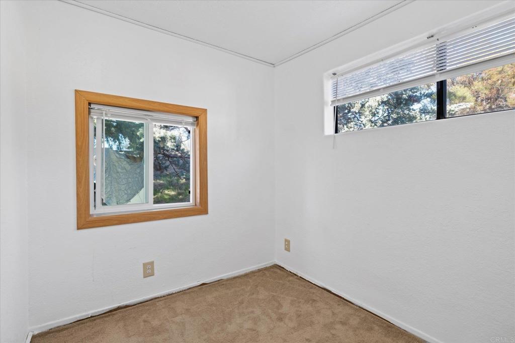 59063 Reynolds Way Anza, CA 92539 - Photo 21 of 34 an empty room with a window