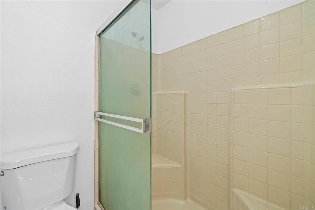 59063 Reynolds Way Anza, CA 92539 - Photo 24 of 34 a bathroom with a glass door shower