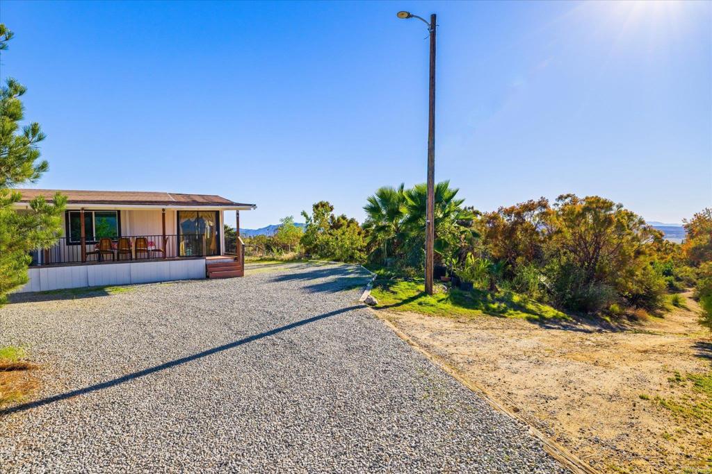 59063 Reynolds Way Anza, CA 92539 - Photo 26 of 34 a view of house with outdoor space