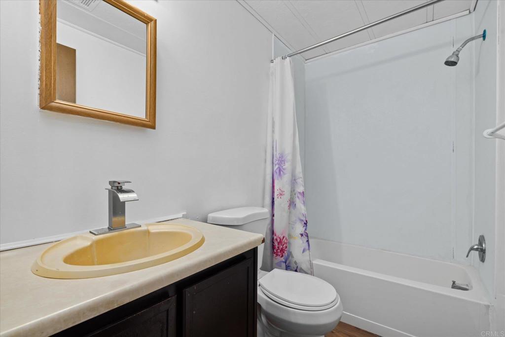 59063 Reynolds Way Anza, CA 92539 - Photo 10 of 34 a bathroom with a sink toilet and shower