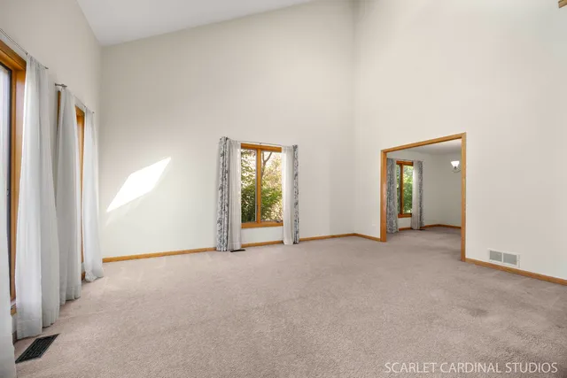 an empty room with windows