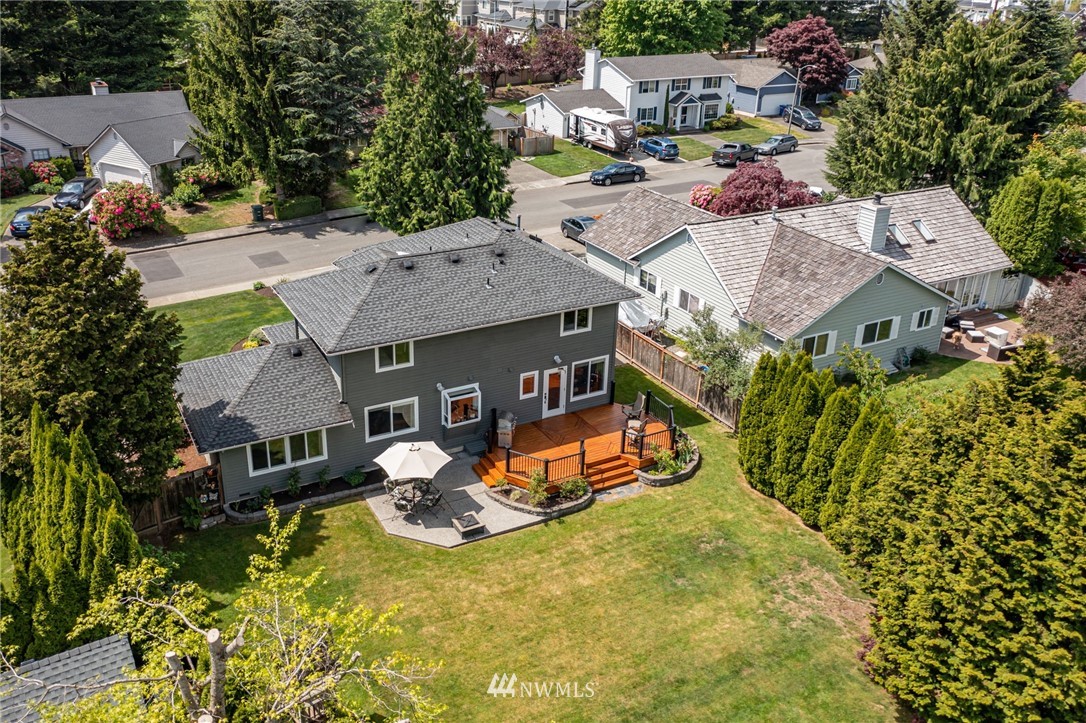 24229 15th Place Southeast Bothell, WA 98021 - Photo 33 of 40 an aerial view of a house with yard swimming pool and outdoor seating