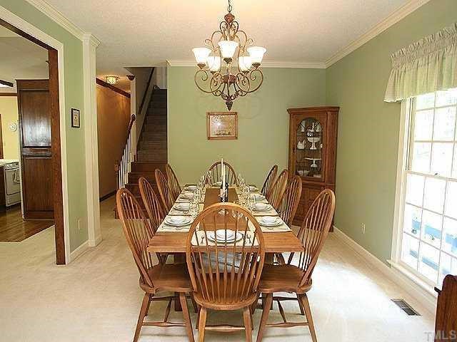5220 Leiden Lane Raleigh, NC 27606 - Photo 3 of 12 This Dining room seats 10-12 easily. The room behind you (to your left as you come in the front door) has been a music room and an office - your choice.