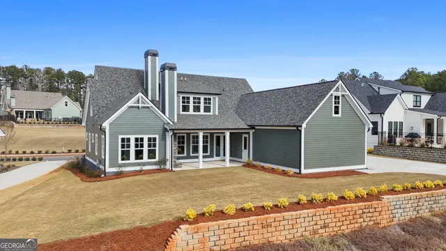 a view of garage yard and tree