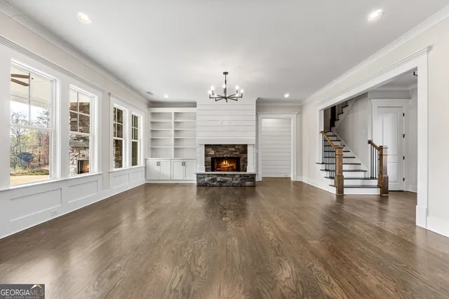 a kitchen with stainless steel appliances granite countertop a stove and a sink