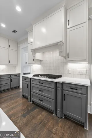a view of workspace with wooden floor and windows