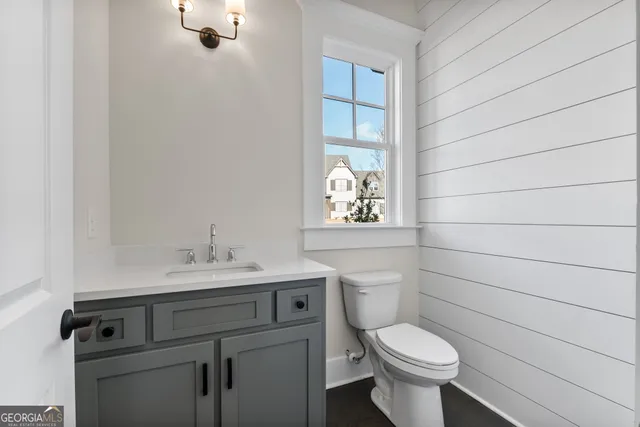 a white tub sitting next to a window