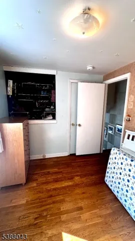 a rug with a book shelf and a rug