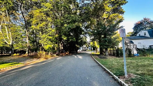 a view of a street with houses